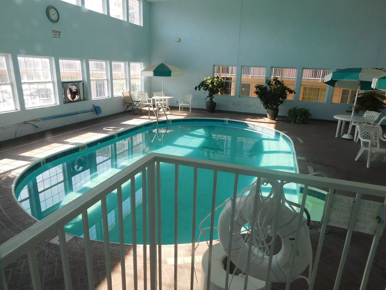 Indoor pool and spa tub area at Angel Inn Central Branson